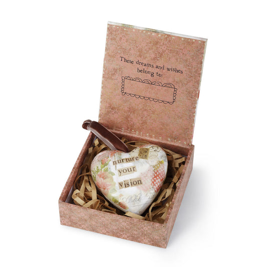 Pink bird print box with heart-shaped decorations