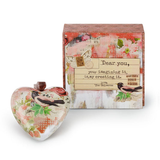 Pink bird print box with heart-shaped decorations